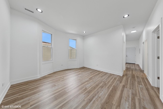 6630 S Drexel Ave, Chicago, IL 60637 - unfurnished room with light wood-style floors and recessed lighting
