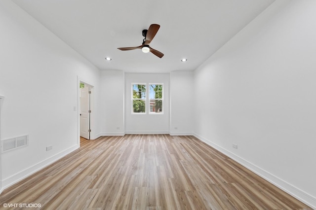 6630 S Drexel Ave, Chicago, IL 60637 - empty room featuring light wood-style flooring, ceiling fan, and recessed lighting