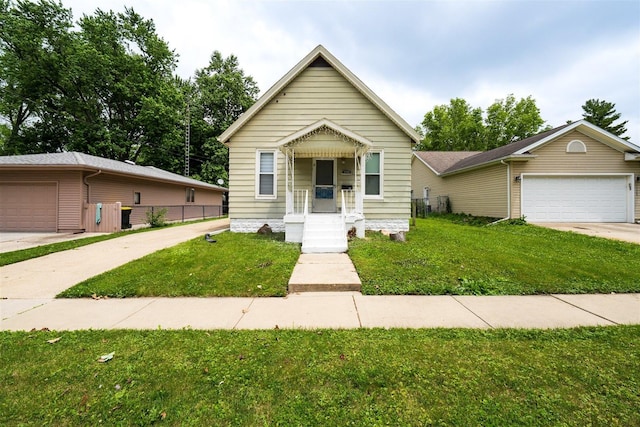 1006 S Adelaide St, Normal, IL 61761 - view of front of home featuring a garage and driveway