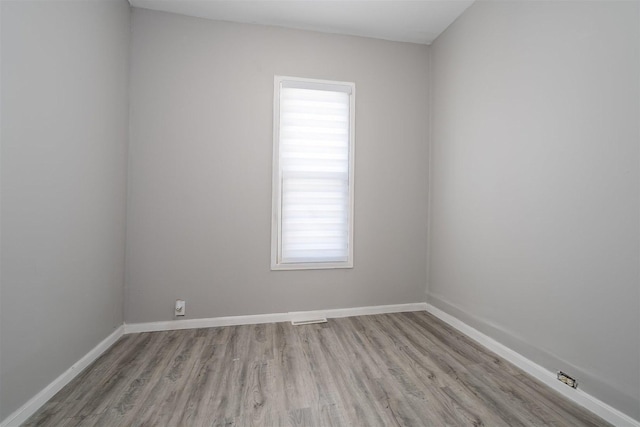 1006 S Adelaide St, Normal, IL 61761 - unfurnished room with light wood-style floors