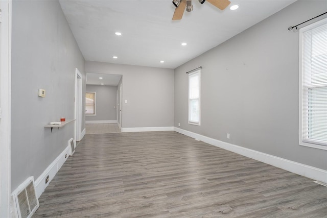 1006 S Adelaide St, Normal, IL 61761 - empty room featuring recessed lighting, ceiling fan, and wood finished floors