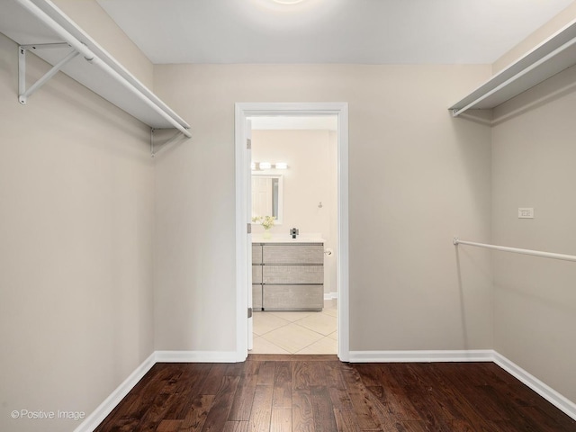 2S578 Patrick Henry Sq Unit 578, Oak Brook, IL 60523 - spacious closet featuring wood finished floors