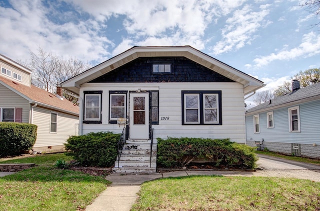 1318 N Prairie Ave, Joliet, IL 60435 - view of front of house with entry steps and a front yard