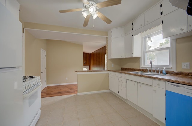 1318 N Prairie Ave, Joliet, IL 60435 - kitchen with white appliances, white cabinets, ceiling fan, and dark countertops