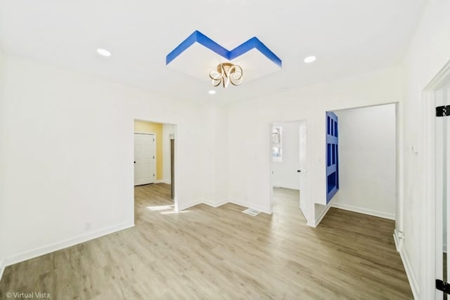 1216 Park Ave, Chicago Heights, IL 60411 - unfurnished room with wood finished floors, a chandelier, and recessed lighting
