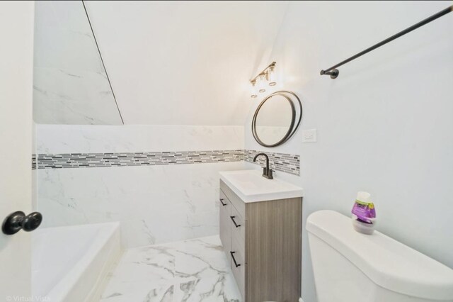 1216 Park Ave, Chicago Heights, IL 60411 - bathroom with vanity, marble look tile flooring, and a bathtub