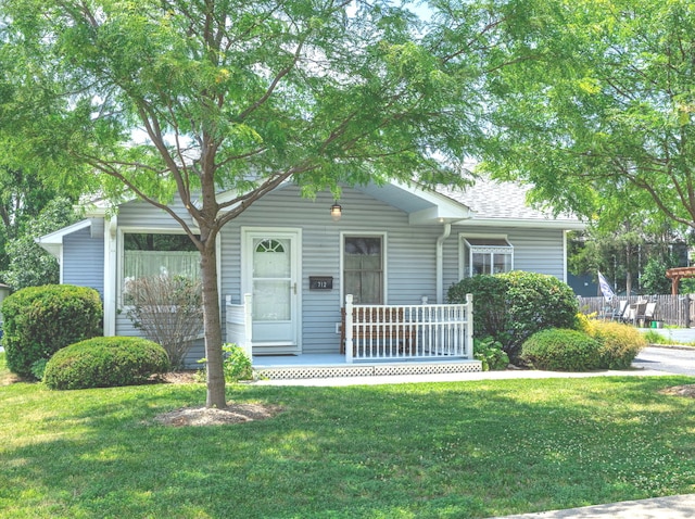 712 S Finley Rd, Lombard, IL 60148 - view of front of house featuring a porch and a front lawn