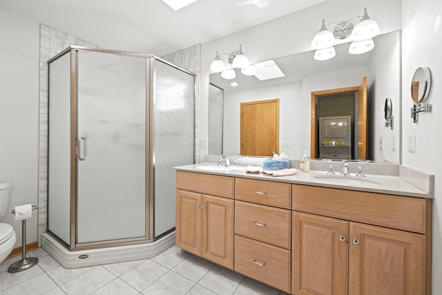 712 S Finley Rd, Lombard, IL 60148 - full bathroom with a skylight, double vanity, a shower stall, and tile patterned flooring