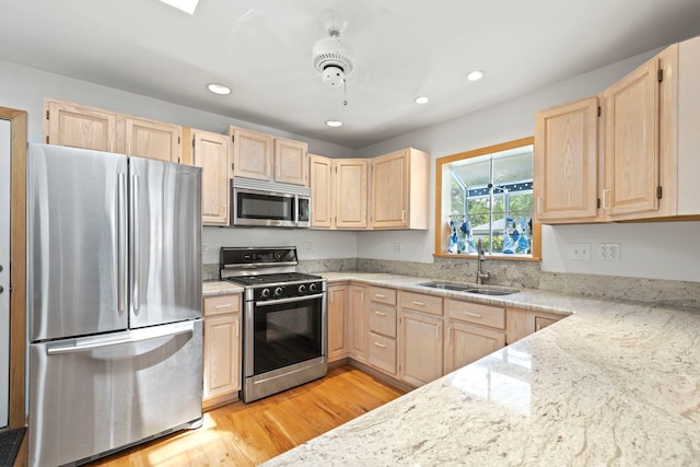 712 S Finley Rd, Lombard, IL 60148 - kitchen featuring stainless steel appliances, light brown cabinets, recessed lighting, light stone counters, and light wood-style floors