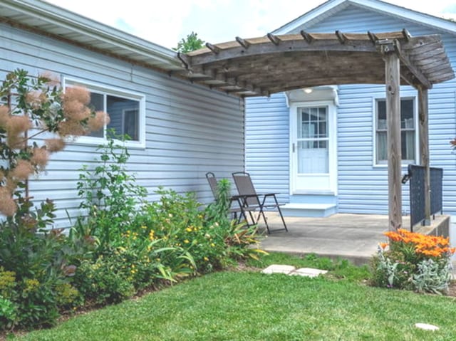 712 S Finley Rd, Lombard, IL 60148 - back of house with a yard, a pergola, and a patio area