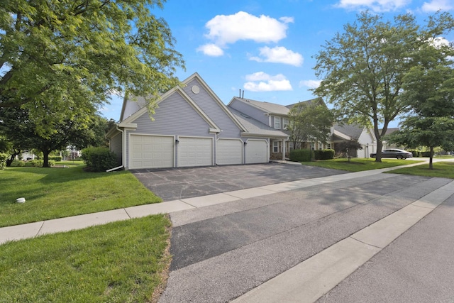 78 Holmes Way Unit W1, Schaumburg, IL 60193 - traditional home featuring driveway, a front yard, and a garage