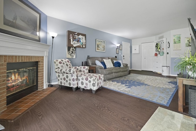 78 Holmes Way Unit W1, Schaumburg, IL 60193 - living room featuring a brick fireplace and wood finished floors