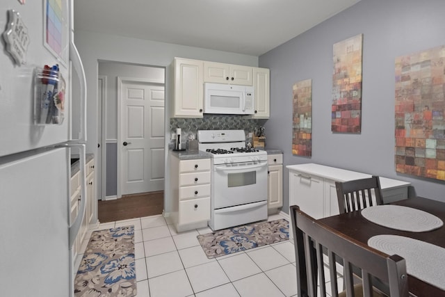 78 Holmes Way Unit W1, Schaumburg, IL 60193 - kitchen with white appliances, tasteful backsplash, white cabinetry, and light tile patterned floors