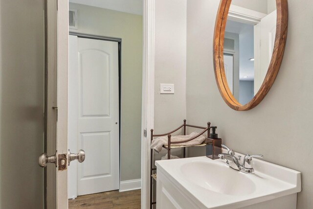 16301 Sherwood Dr, Orland Park, IL 60462 - bathroom featuring wood finished floors and vanity