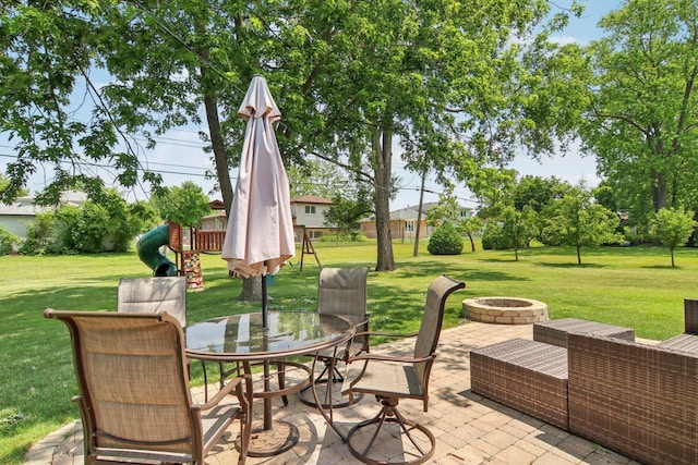 16301 Sherwood Dr, Orland Park, IL 60462 - view of patio with an outdoor fire pit, a playground, and outdoor dining space