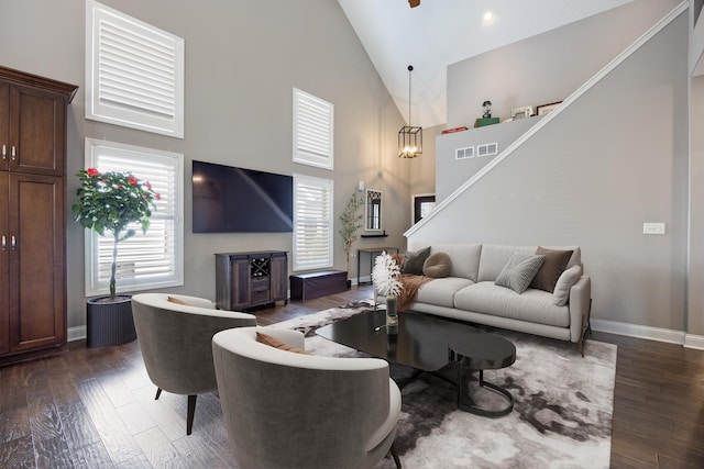 565 Sudbury Cir Unit 0, Oswego, IL 60543 - living room featuring high vaulted ceiling, dark wood finished floors, and stairs