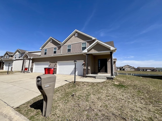 1320 Myrtle Beach Ave, Champaign, IL 61822 - multi unit property with driveway, an attached garage, and a residential view