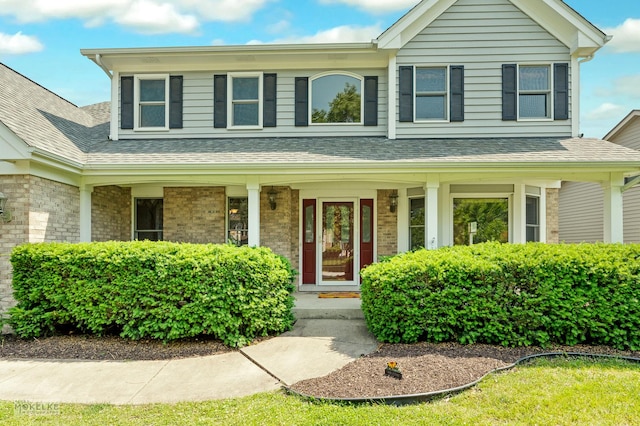 3624 Eliot Ln, Naperville, IL 60564 - view of front of home with covered porch and a shingled roof