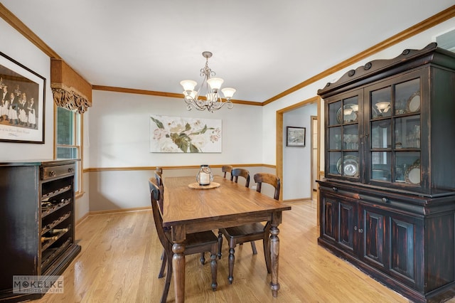 3624 Eliot Ln, Naperville, IL 60564 - dining area with a chandelier, light wood-style flooring, and ornamental molding
