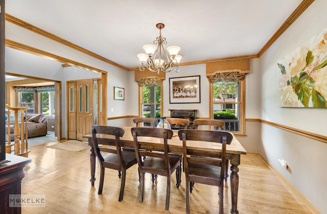 3624 Eliot Ln, Naperville, IL 60564 - dining space with a chandelier, light wood-type flooring, and ornamental molding