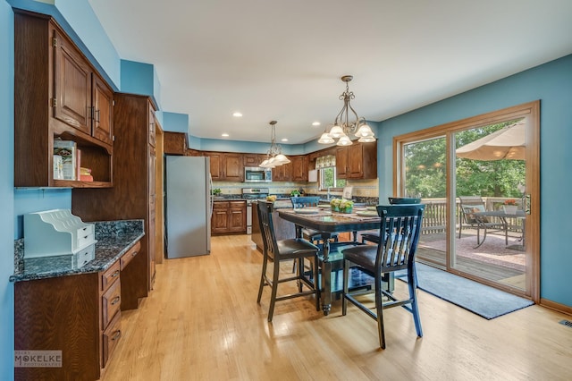 3624 Eliot Ln, Naperville, IL 60564 - dining space featuring light wood finished floors, a chandelier, and recessed lighting