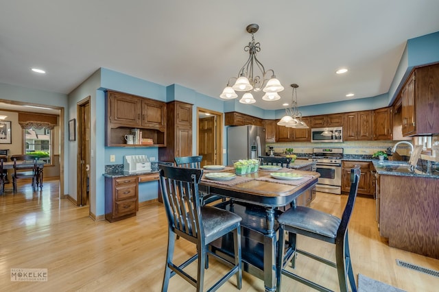 3624 Eliot Ln, Naperville, IL 60564 - dining room featuring light wood-style flooring, a chandelier, and recessed lighting