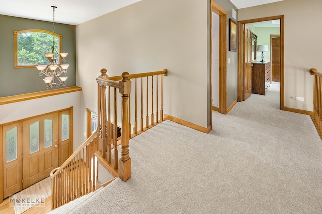 3624 Eliot Ln, Naperville, IL 60564 - hallway with an upstairs landing, a chandelier, and carpet