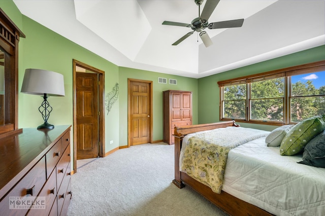 3624 Eliot Ln, Naperville, IL 60564 - bedroom with light carpet, a tray ceiling, and ceiling fan