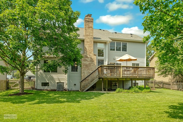 3624 Eliot Ln, Naperville, IL 60564 - rear view of house featuring a deck, stairway, a fenced backyard, a chimney, and roof with shingles