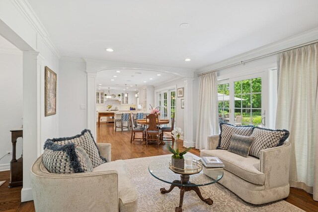 611 Oak Knoll Dr, Lake Forest, IL 60045 - living room featuring decorative columns, crown molding, wood finished floors, and recessed lighting