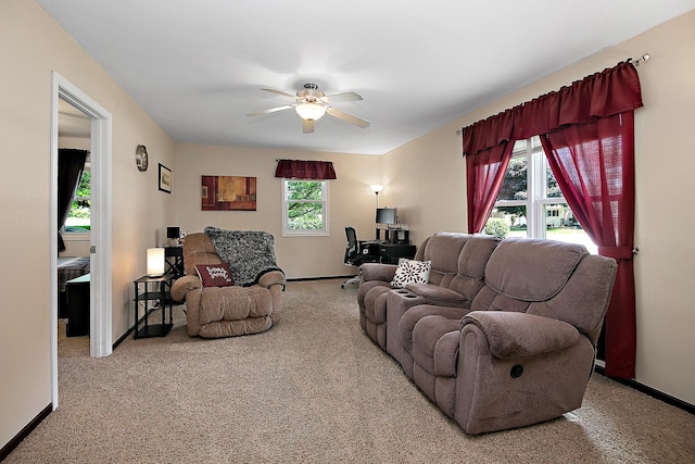 400 W Adams St, Danforth, IL 60930 - living area with a ceiling fan, carpet flooring, and a desk