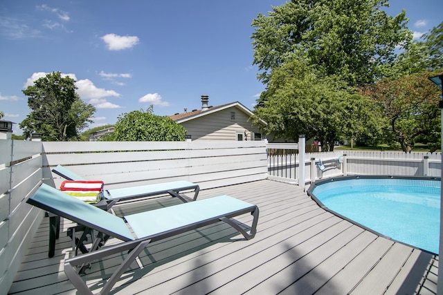 400 W Adams St, Danforth, IL 60930 - view of swimming pool featuring a wooden deck