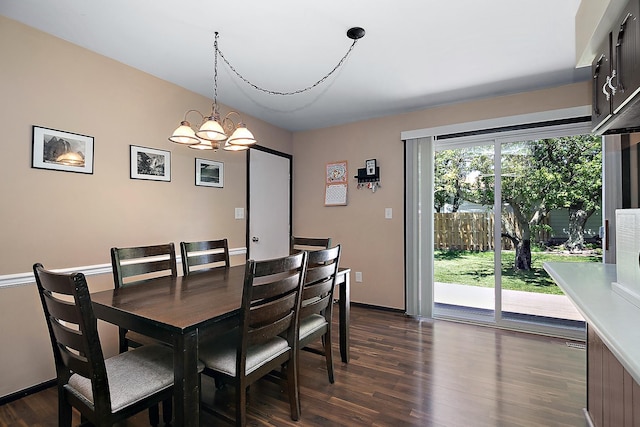 400 W Adams St, Danforth, IL 60930 - dining room with a chandelier and dark wood-style floors