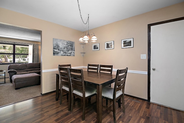 400 W Adams St, Danforth, IL 60930 - dining room featuring a chandelier and dark wood-type flooring