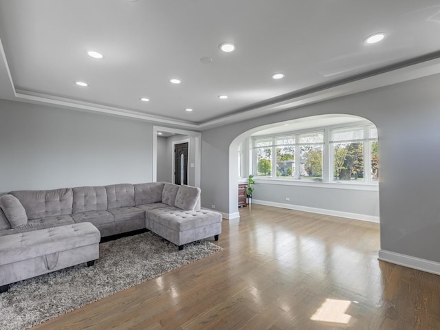 9712 W Shore Dr, Oak Lawn, IL 60453 - living room with arched walkways, a raised ceiling, wood finished floors, and recessed lighting