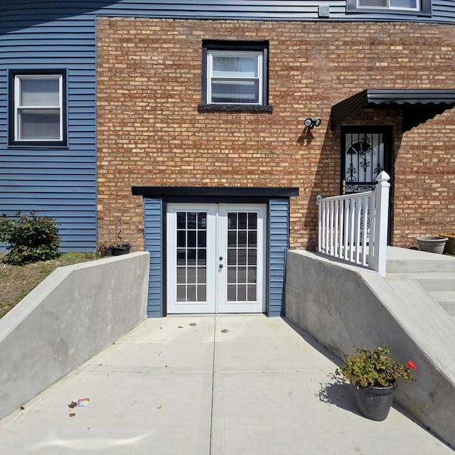 9712 W Shore Dr, Oak Lawn, IL 60453 - property entrance with french doors and brick siding