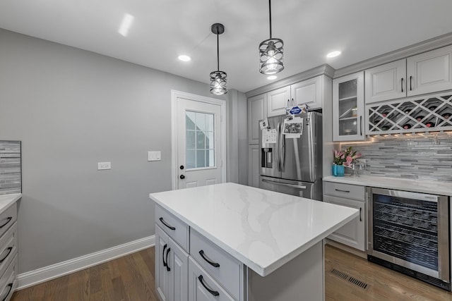 9712 W Shore Dr, Oak Lawn, IL 60453 - kitchen featuring stainless steel fridge, wine cooler, tasteful backsplash, glass insert cabinets, and dark wood-style floors
