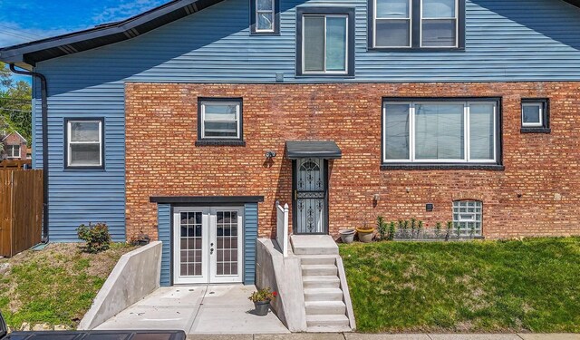 9712 W Shore Dr, Oak Lawn, IL 60453 - view of front of home featuring french doors and brick siding