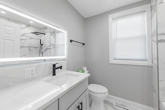 9712 W Shore Dr, Oak Lawn, IL 60453 - bathroom with vanity, marble look tiles, a marble finish shower, and recessed lighting