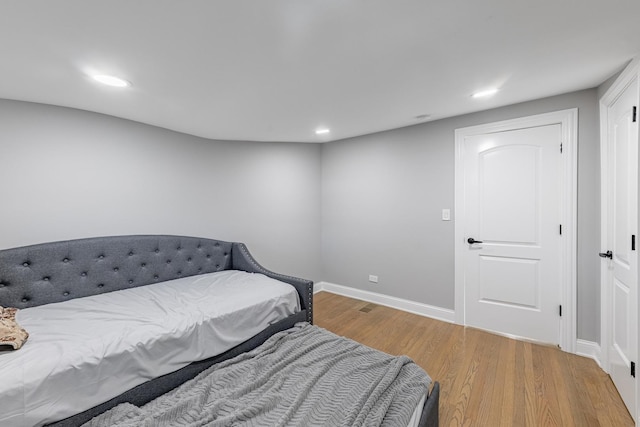 9712 W Shore Dr, Oak Lawn, IL 60453 - bedroom featuring wood finished floors and recessed lighting