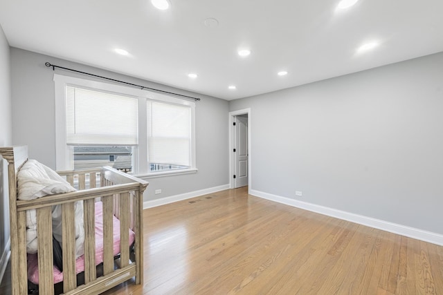 9712 W Shore Dr, Oak Lawn, IL 60453 - bedroom featuring light wood finished floors and recessed lighting