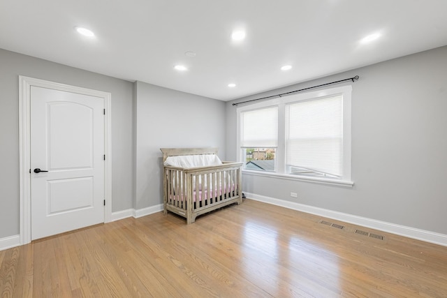 9712 W Shore Dr, Oak Lawn, IL 60453 - bedroom featuring light wood finished floors and recessed lighting
