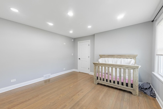 9712 W Shore Dr, Oak Lawn, IL 60453 - bedroom with wood finished floors and recessed lighting