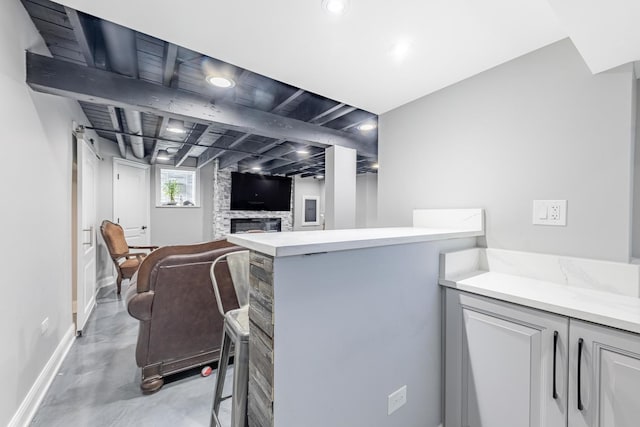 9712 W Shore Dr, Oak Lawn, IL 60453 - bar area featuring concrete flooring, a stone fireplace, and recessed lighting