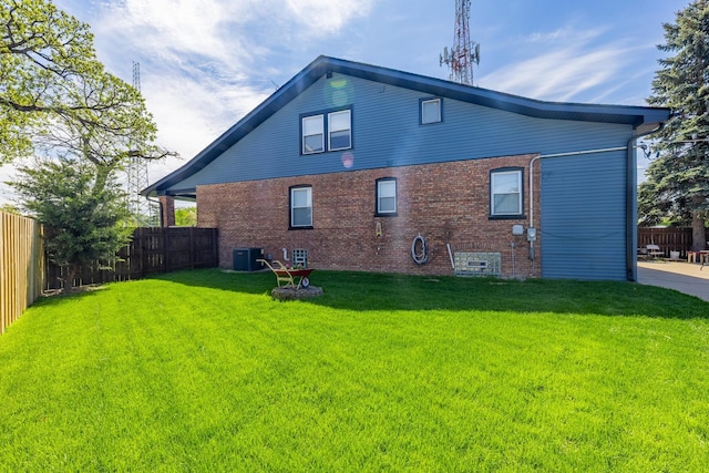9712 W Shore Dr, Oak Lawn, IL 60453 - rear view of house with a fenced backyard and brick siding