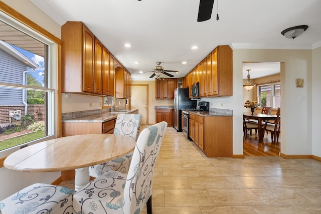11 E Appletree Ln, Arlington Heights, IL 60004 - kitchen with appliances with stainless steel finishes, ceiling fan, recessed lighting, brown cabinetry, and crown molding