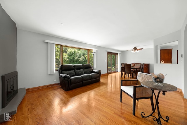 641 E Belmont Ave, Addison, IL 60101 - living area featuring light wood finished floors and a ceiling fan