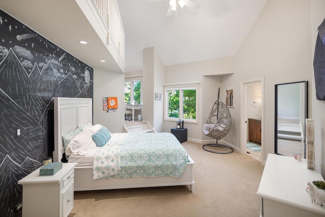 1091 Johnson Dr, Naperville, IL 60540 - bedroom with an accent wall, light carpet, high vaulted ceiling, connected bathroom, and recessed lighting