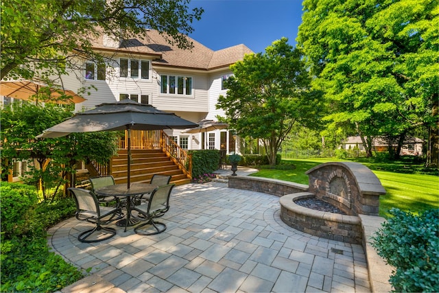 1091 Johnson Dr, Naperville, IL 60540 - view of patio featuring stairs, a fire pit, and outdoor dining space