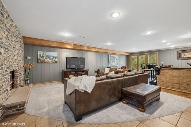 184A River Rd, Lake Barrington, IL 60010 - living area with wooden walls, a brick fireplace, recessed lighting, and tile patterned floors